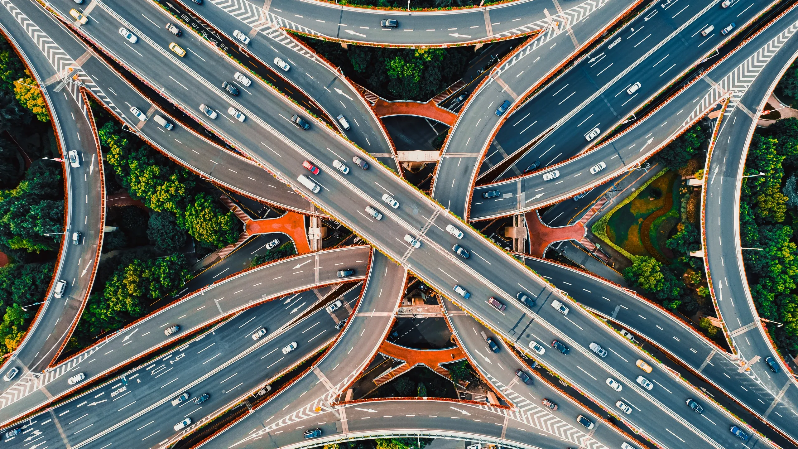 A multi-level motorway interchange seen from directly above